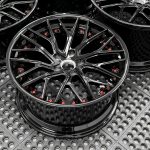 DB10 GLOSS BLACK LIP AND CENTER SATIN RED HARDWARE DB10 GLOSS BLACK LIP AND CENTER SATIN RED HARDWARE